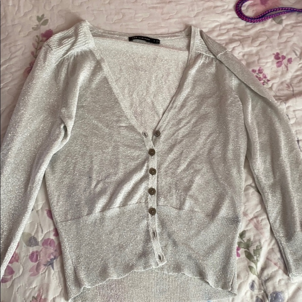 a silver/shiny cardigan!